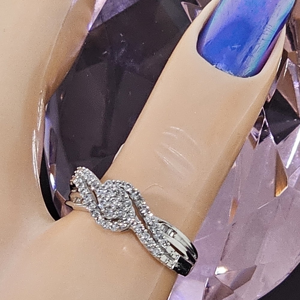 925 Sterling Silver with diamonds ring size.7